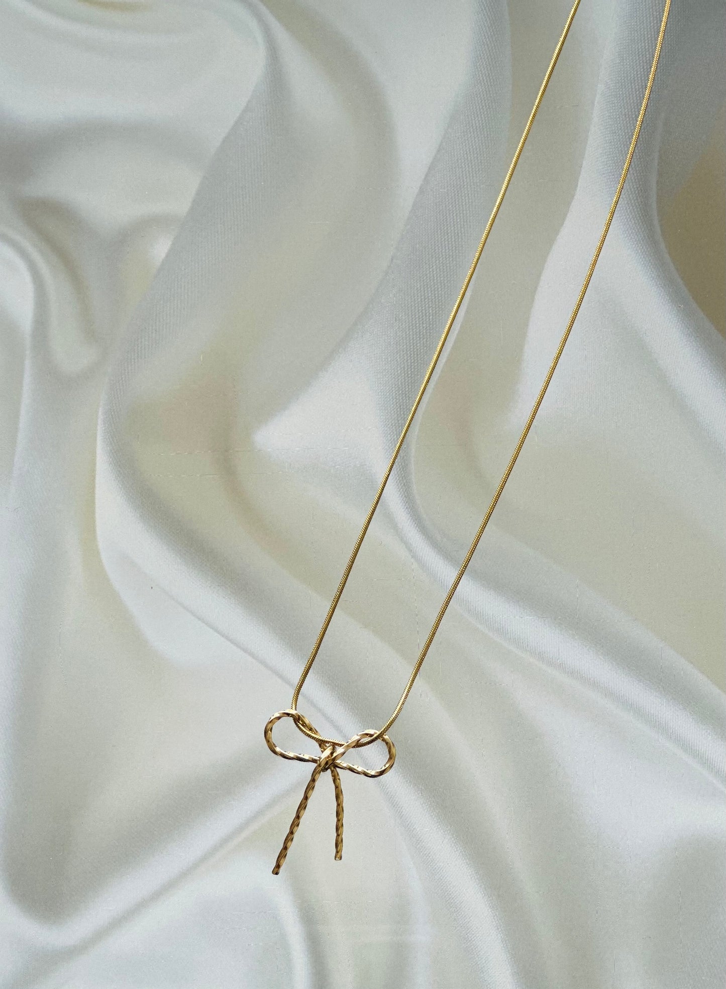 Tangled Bow necklace