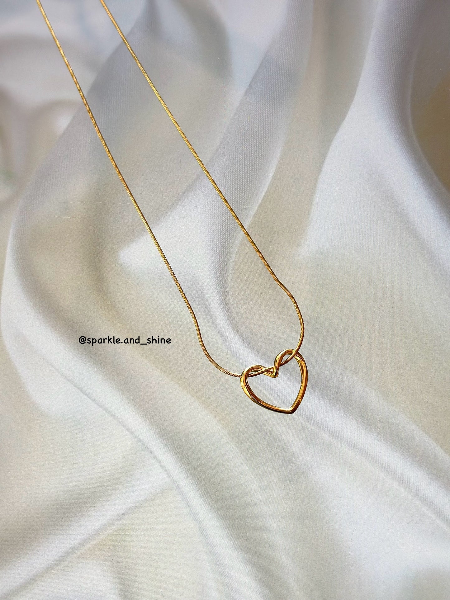 Tangled heart necklace